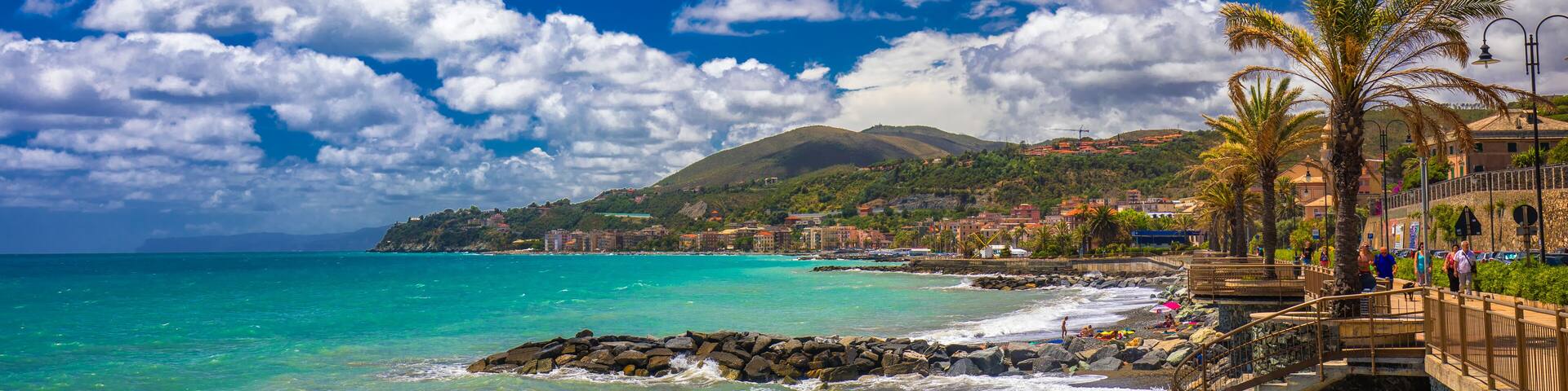 Coastline promenade with palm trees in Cogoleto town on Italien riviera