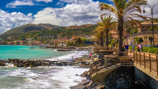 Coastline promenade with palm trees in Cogoleto town on Italien riviera