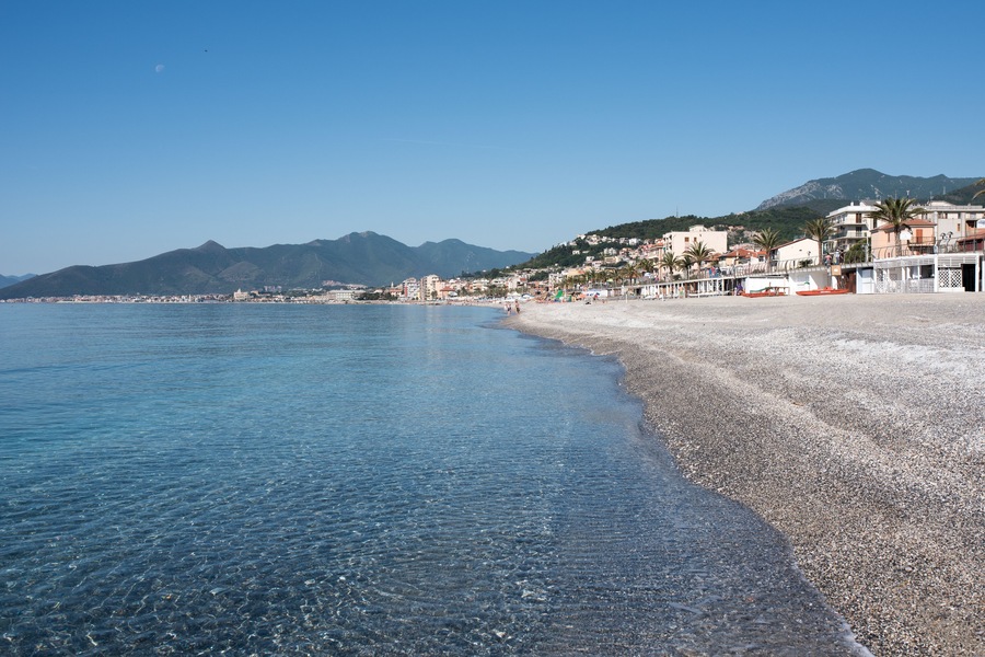 Pietra Ligure, famous little city in Liguria, Italy, seen from the beach, seascape of Pietra Ligure, Italian tipical beach