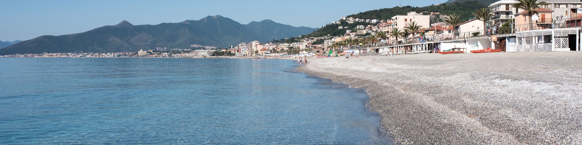 Pietra Ligure, famous little city in Liguria, Italy, seen from the beach, seascape of Pietra Ligure, Italian tipical beach