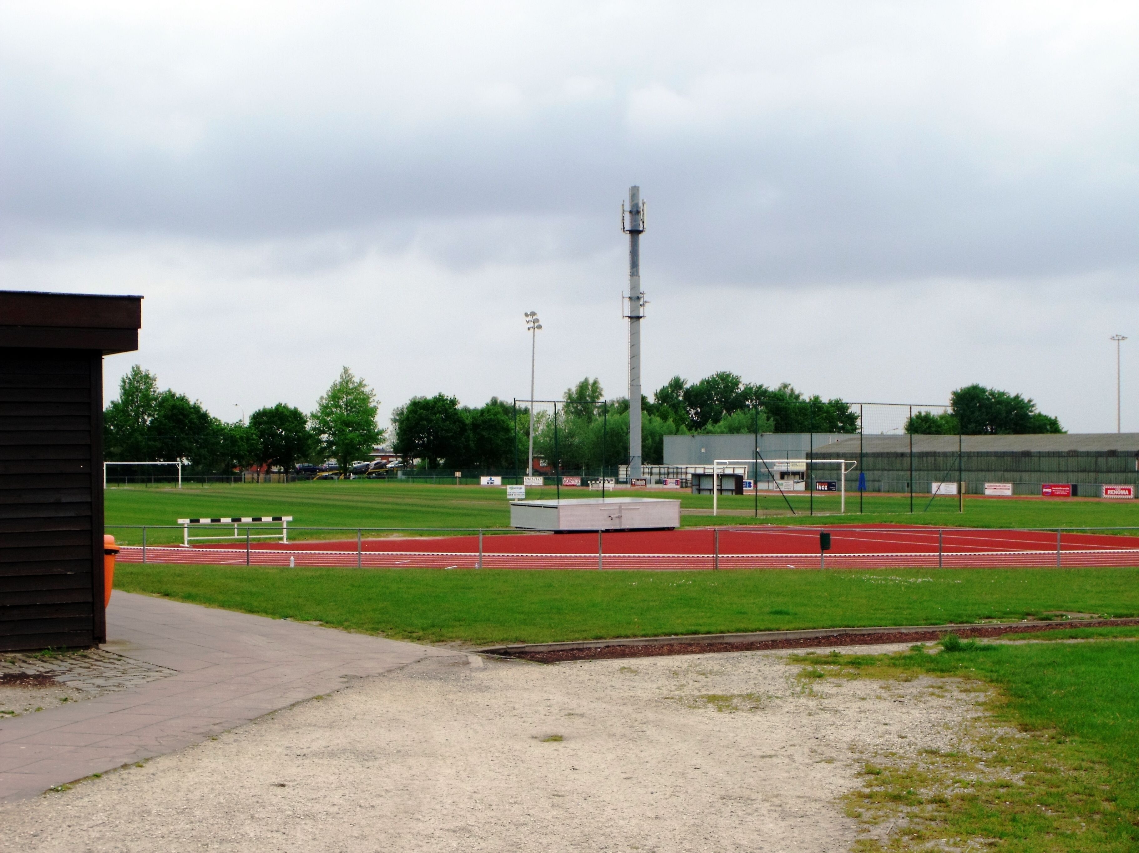 The ground can be seen beyond the athletics track.