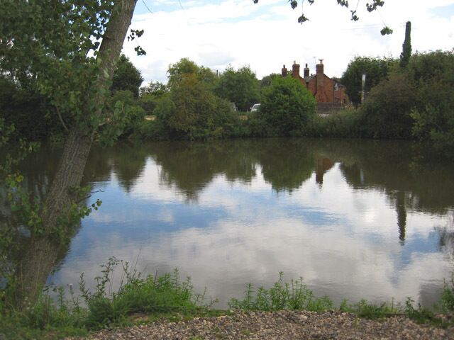 Roadside lake at Waters Meet The A417 cuts through behind the car park.