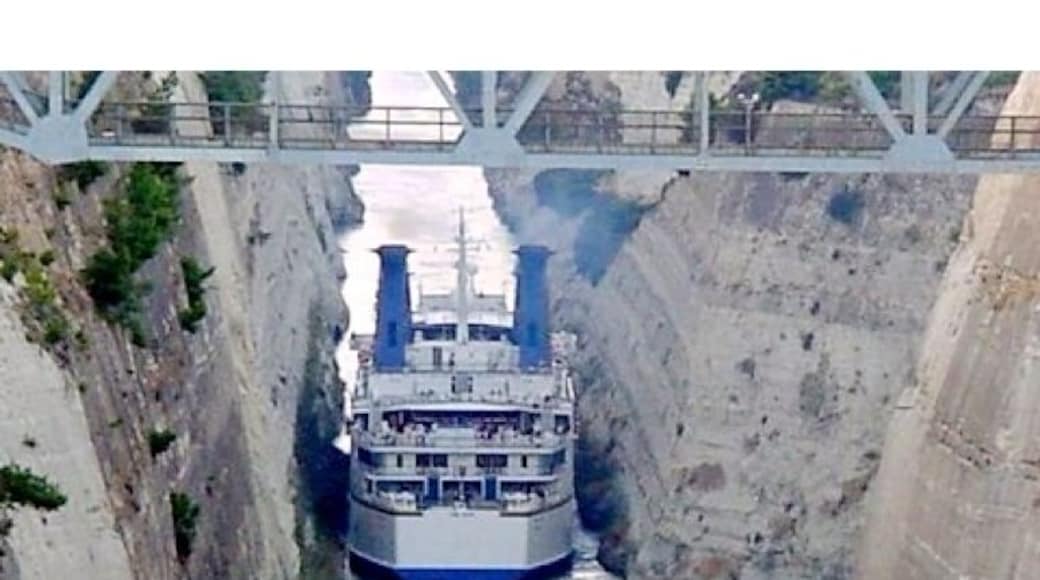 Ship going through canal from Gulf of Corinth to the Saronic Gulf.