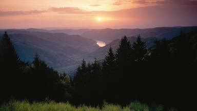 Weissenkirchen in der Wachau featuring mountains, tranquil scenes and a sunset
