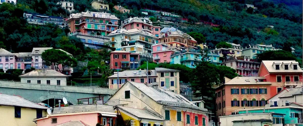 Bogliasco is a typical Ligurian village, arrayed at the foot of a mountain, with pastel-colored houses scattering down the hillside to the sea.