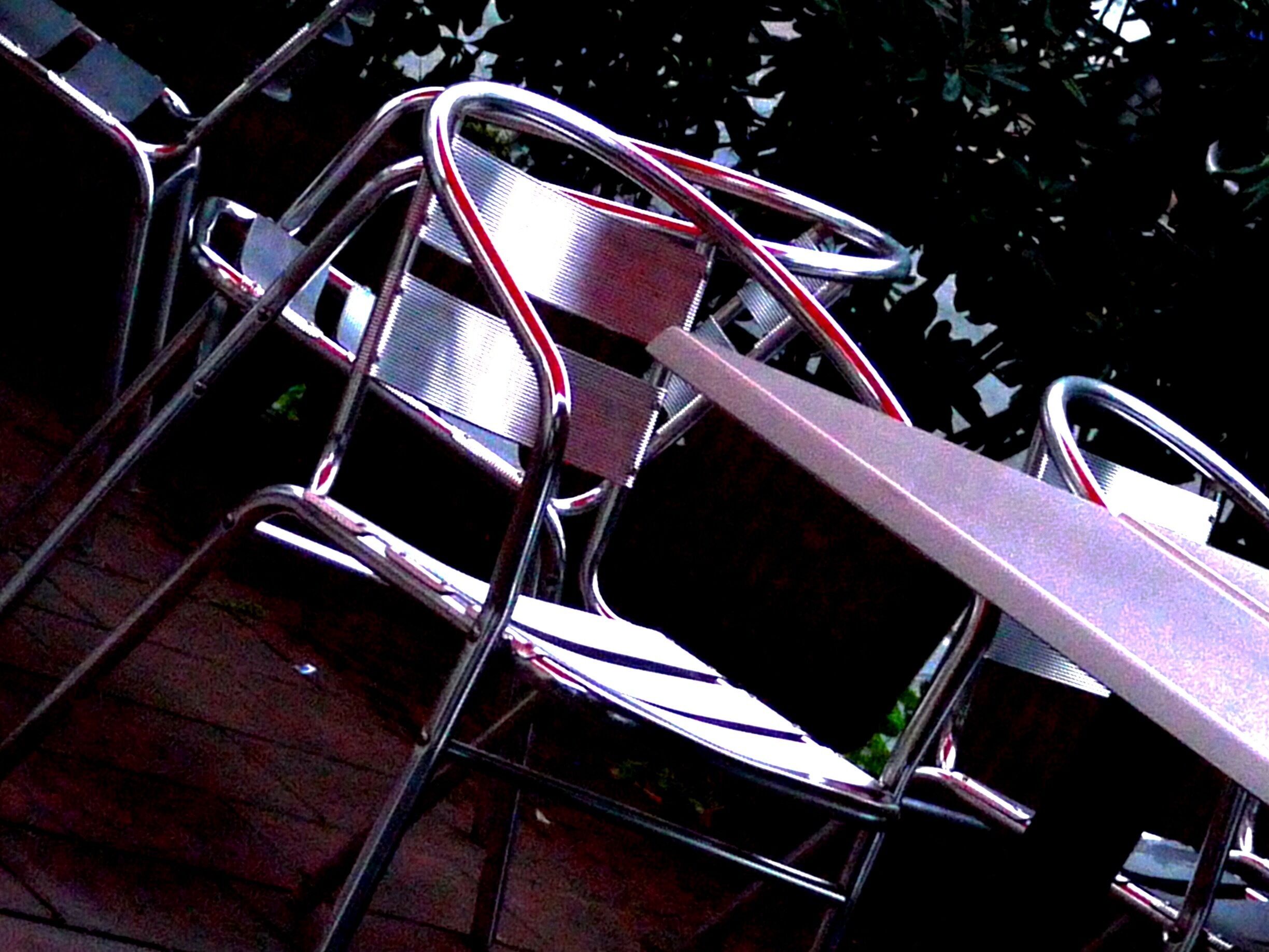 After searching for hours online with no luck whatsoever, I am reduced to providing only a description as a name. But this is a terrific place.  A very informal order-at-the-counter "bar" that will serve you sandwiches and soup, grilled vegetables and salad, and a nice chunk of cake if you're up to it. I recommend it highly. You'll find it on the corner near the overpass of the Via Aurelia.  Just remember "red umbrellas," and you can't go wrong.