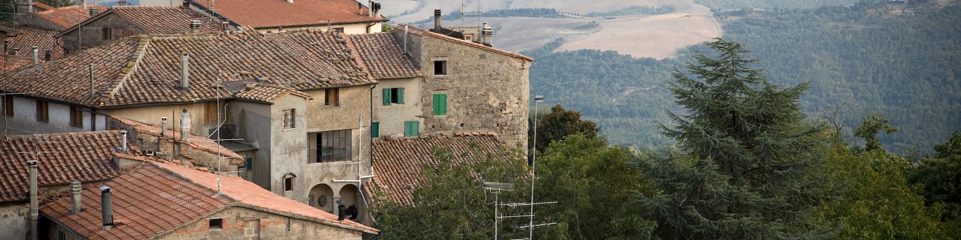 View of rootops of Piancastagnaio with countryside - Italy