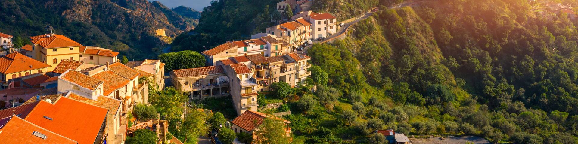 Aerial view of Savoca village in Sicily, Italy. Sicilian village Savoca (known from the Godfather movies). Houses on a hill in Savoca, small town on Sicily in Italy.