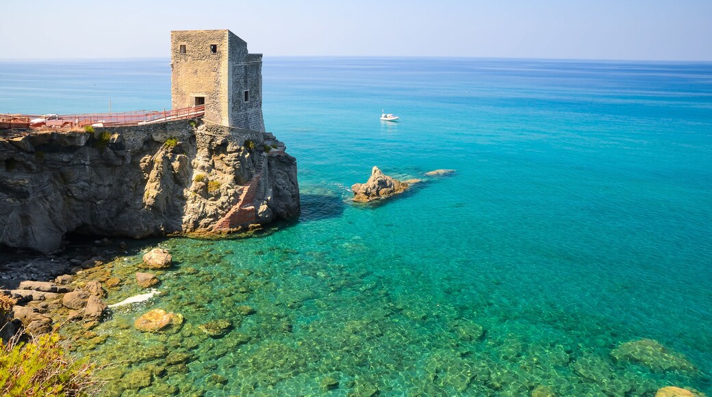 Torre delle Ciavole, a medieval guard watchtower on the rocky northern Sicilian coast with crystal clear sea water near Gliaca di Piraino, between Brolo and Gioiosa Marea.