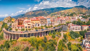 Panoramic summer view from flying drone of San Lucido - town and comune in the province of Cosenza in the Calabria region. Impressive summer scene of Italy, Europe. Traveling concept background.
