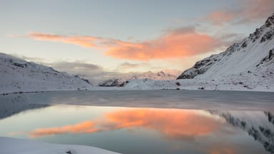 Maurigno lake at sunset during spring. Verva pass, Valdidentro, Lombardy, Italy.