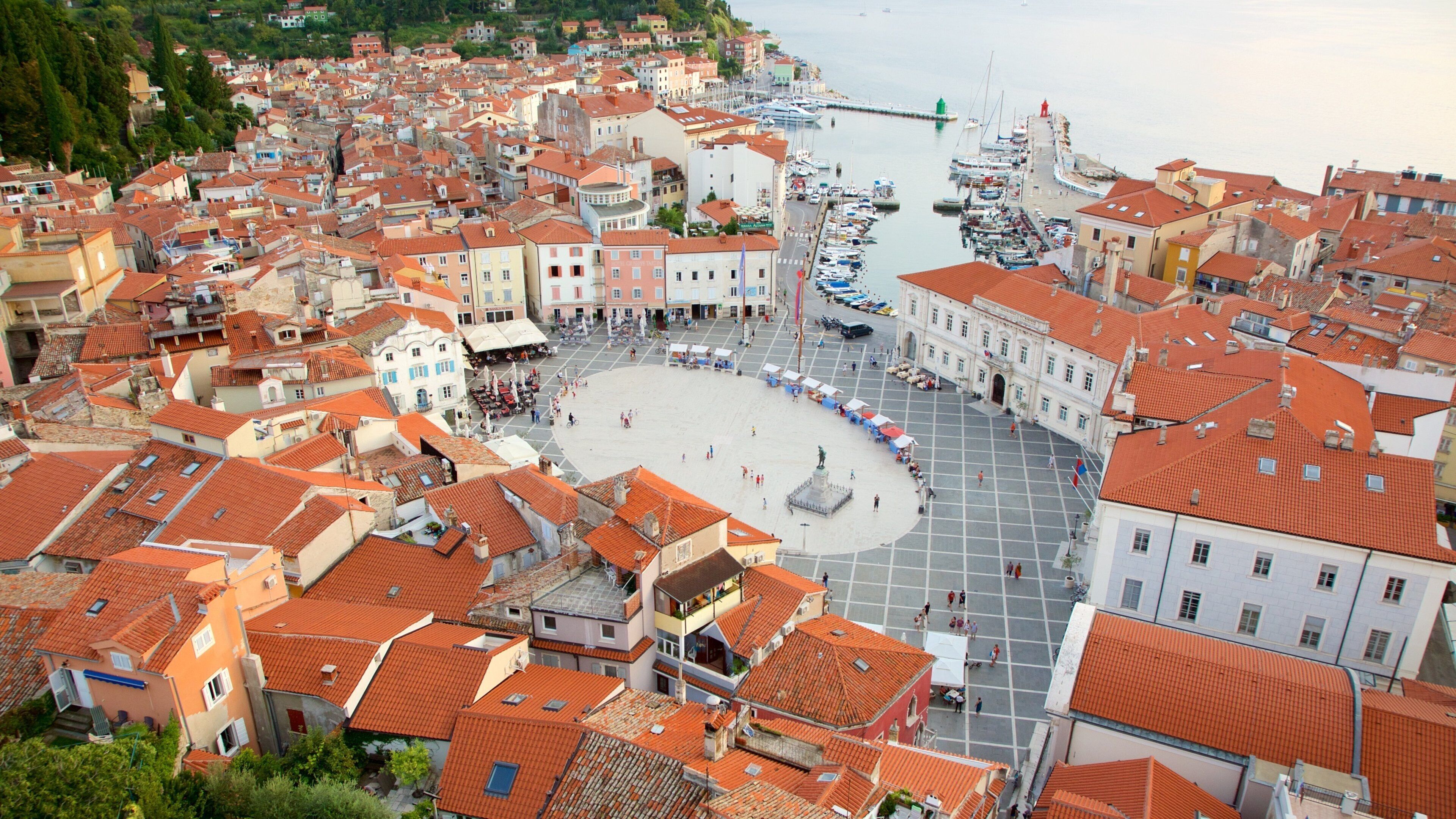 Piran featuring a square or plaza, a coastal town and general coastal views