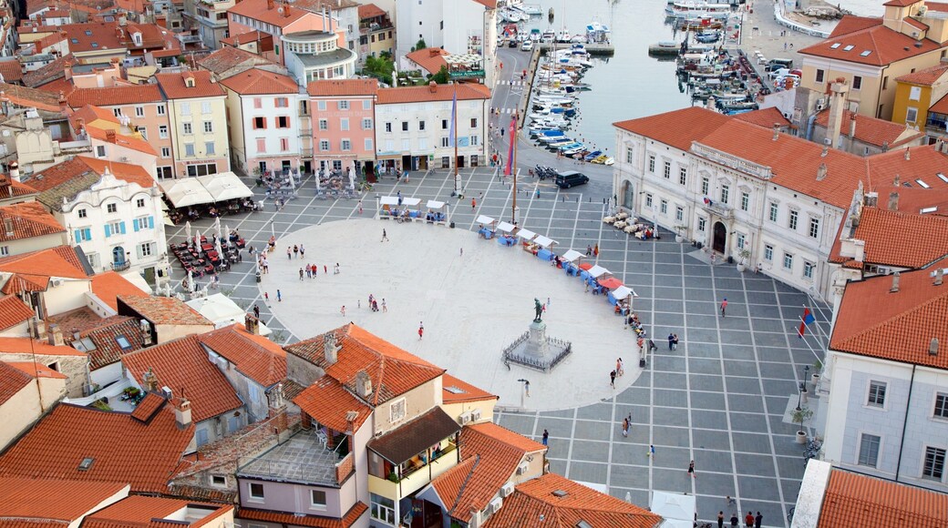 Piran which includes general coastal views, a marina and a coastal town