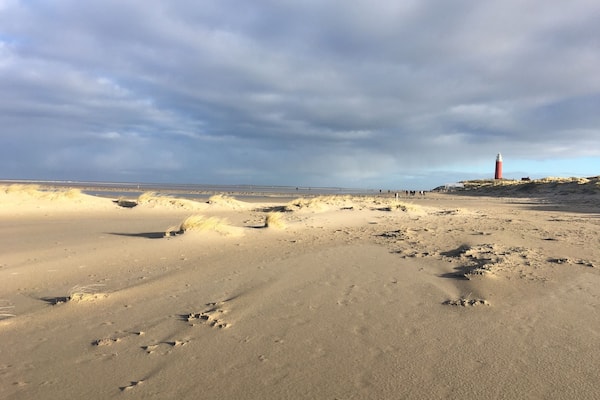 Eierland Lighthouse on the northern tip of the Texel Island ( Netherland).
To get there, take the ferry in Den Helder ( 25€/car). The ferry leaves every hours and the journey takes only 20 minutes.
Texel acquired a lighthouse in 1864, following many years of campaigning by Texel civil-law notary Kikkert. The seas around the island were so dangerous that many ships sank before the lighthouse was finally built, as explained in a tiny exhibition in the lighthouse itself. During the Second World War, the lighthouse was the site of a major part of the action of the Georgian Rebellion, or Russian War; in fact, the bullet holes are still visible in the walls of the tower.