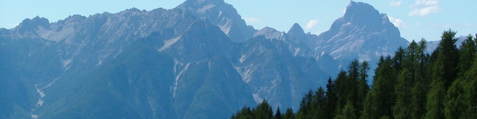 Mounts Duranno and Cima dei Preti(Priest's peak) seen from track to Baion hut in Domegge di Cadore