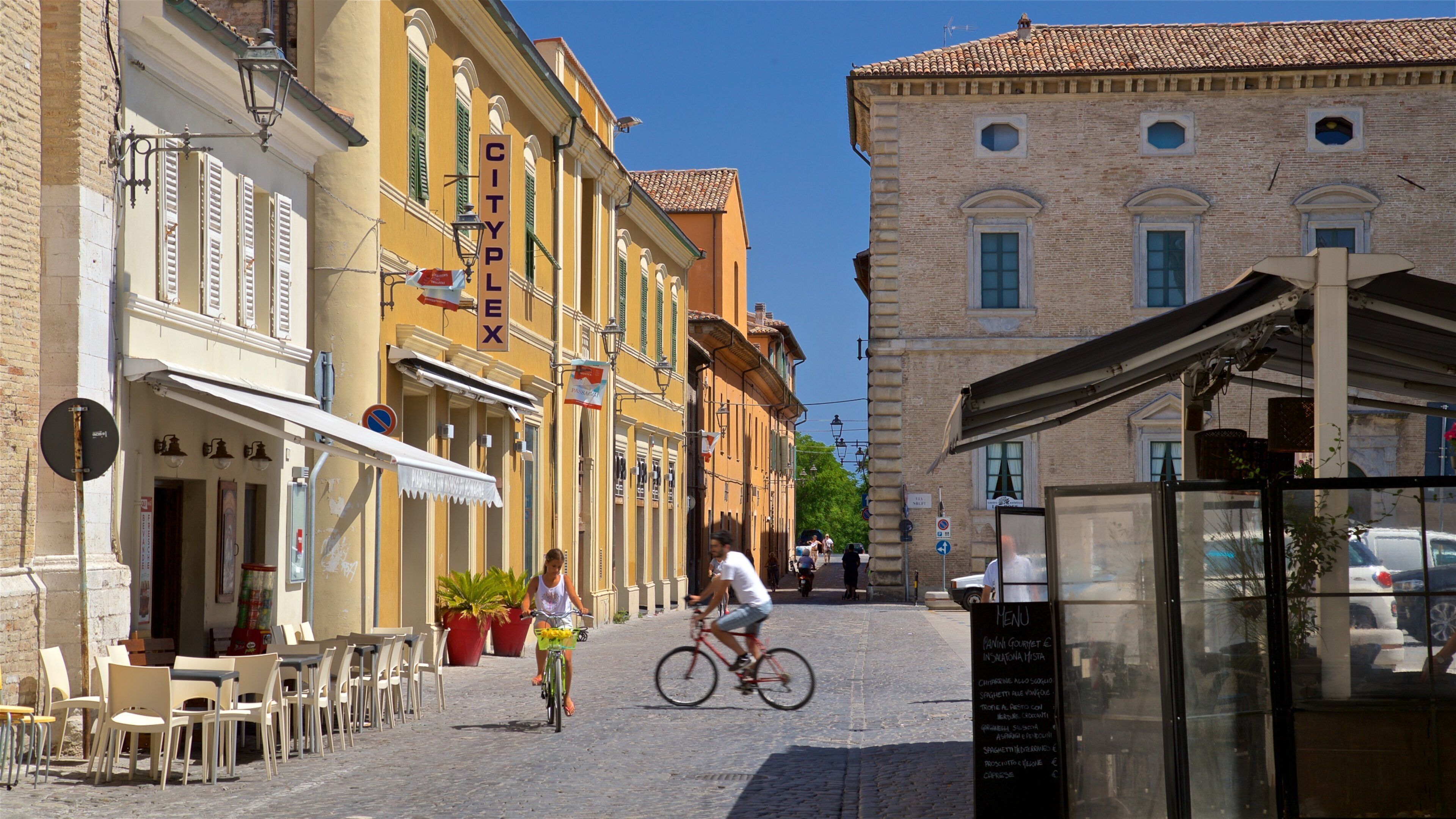 Fano showing street scenes and cycling as well as a couple