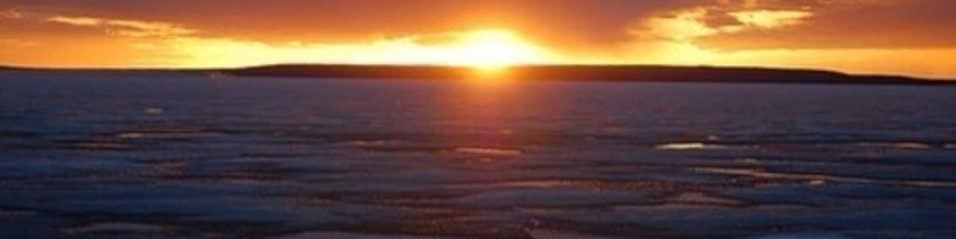 Taken at sun set from the Ski Beach of Waskesiu Lake, Prince Albert National Park on May long weekend. The ice was just starting to break apart but was still strong enough to walk out a bit. By early June, the ice will be off, but rarely is the water warm enough for swimming until July. #nationalpark #goldenhour #bestof5