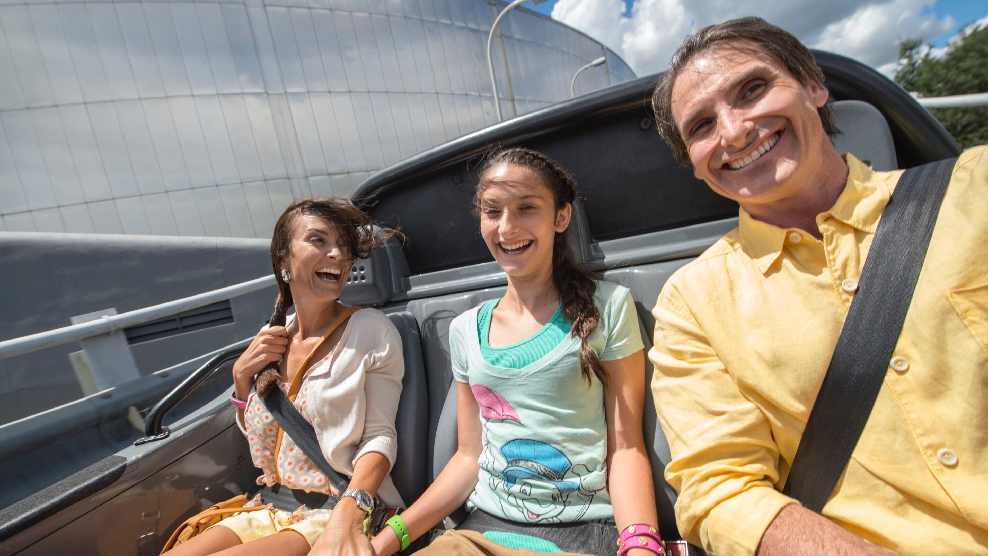 Epcot® featuring rides as well as a family