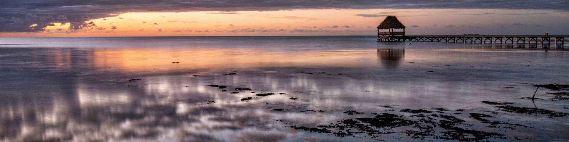 Belize Cayes - Small tropical island at Barrier Reef with paradise beach - known for diving, snorkeling and relaxing vacations - Caribbean Sea, Belize, Central America