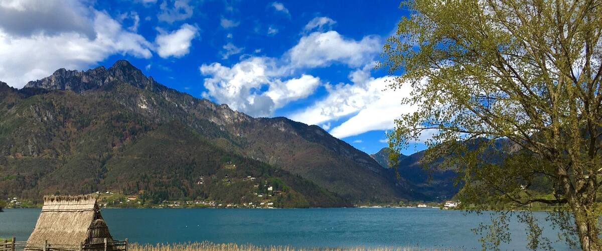Lake Ledro, high up in the mountains near Lake Garda, with prehistoric stilt house