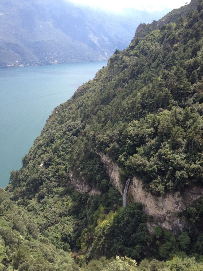 on the edge of the mountain bike route is a beautiful waterfall
