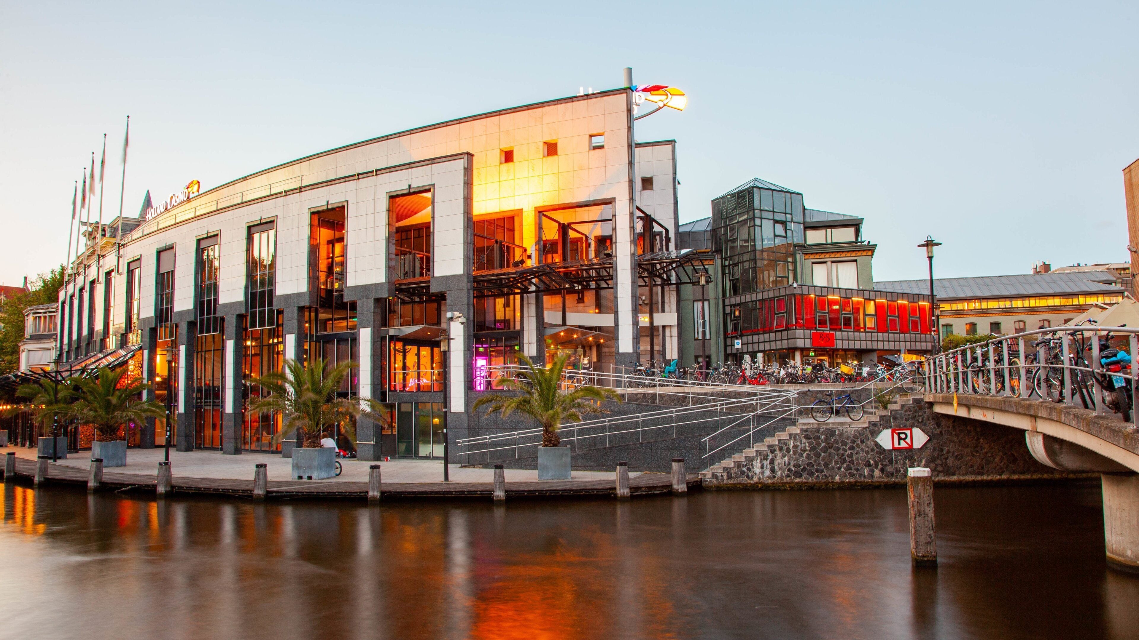 Holland Casino showing a river or creek and modern architecture