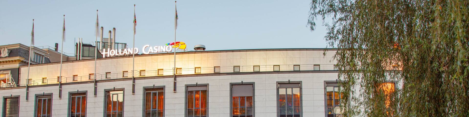 Holland Casino which includes a casino and a river or creek