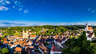 Germany, Bavaria, Gossweinstein, Aerial view of urban landscape with castle and church