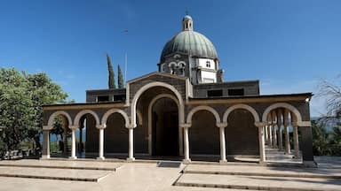 A church with a dome and arched entrance.