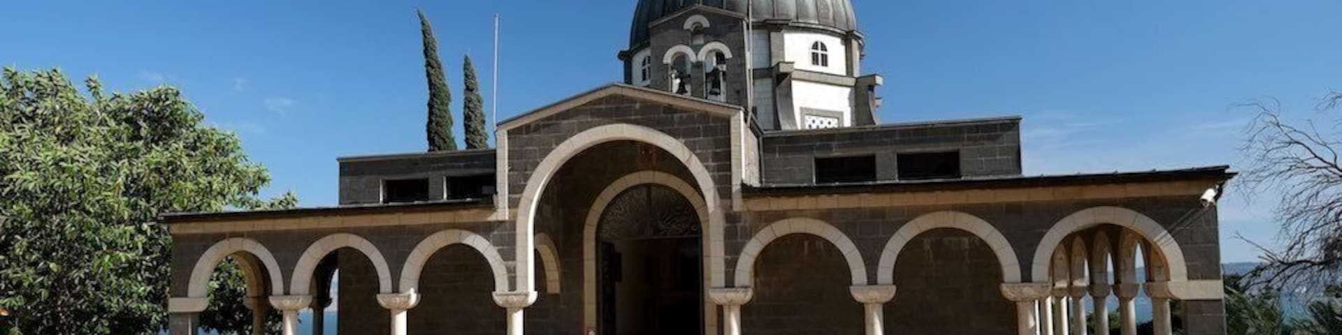 The Mount of Beatitudes, believed to be the setting for Jesus’ most famous discourse, the Sermon on the Mount, is one of the most beautifully serene places in the Holy Land.
The actual location of the Sermon on the Mount is not certain, but the present site has been commemorated for more than 1600 years.
The current Roman Catholic Franciscan chapel was built in 1937-38 following plans by Italian architect Antonio Barluzzi.
Pope John Paul II celebrated a Mass at this site in March 2000. The Jesus Trail pilgrimage route connects the Mount to other sites from the life of Jesus.