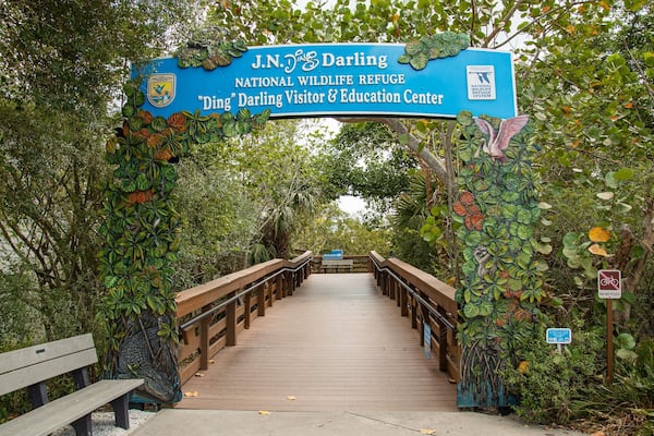 J. N. Ding Darling National Wildlife Refuge showing a bridge and signage