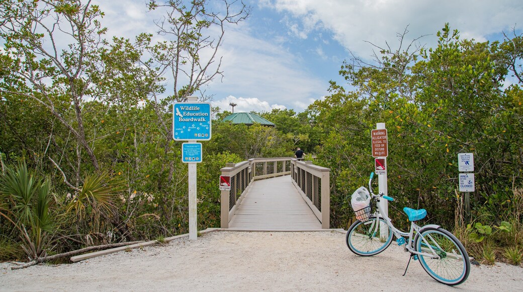 J. N. Ding Darling National Wildlife Refuge showing signage and a bridge