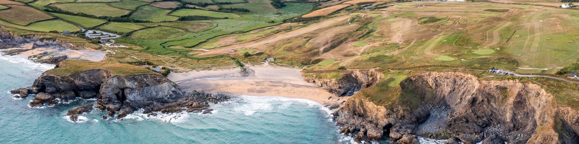 Aerial view of Church Cove and Dollar Cove at Gunwalloe in Cornwall