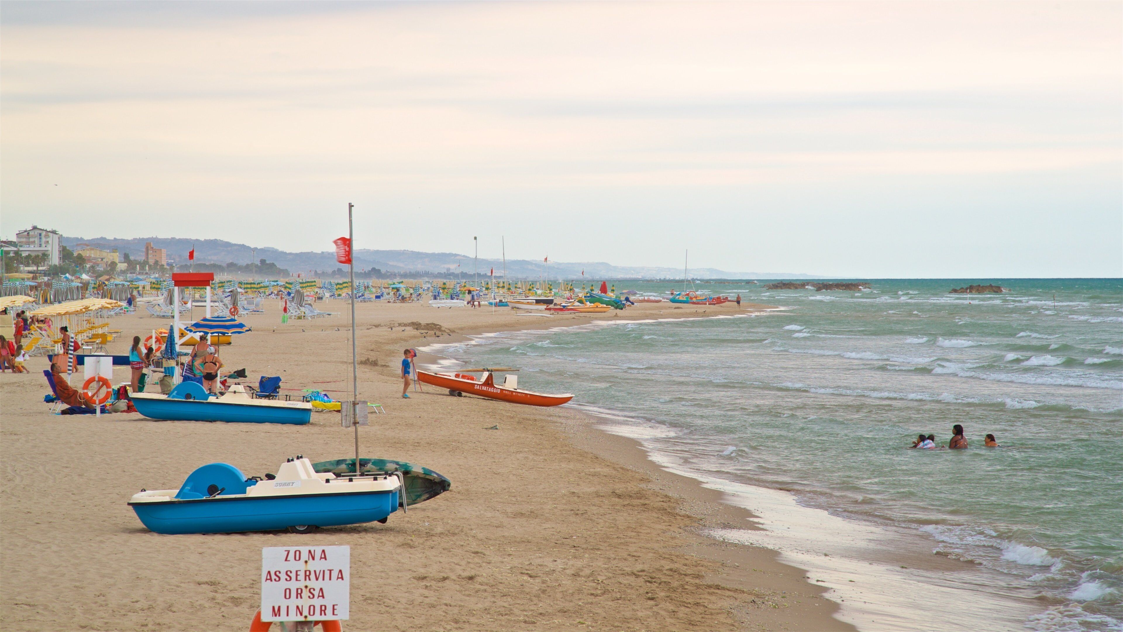 Roseto degli Abruzzi showing swimming, a sandy beach and general coastal views