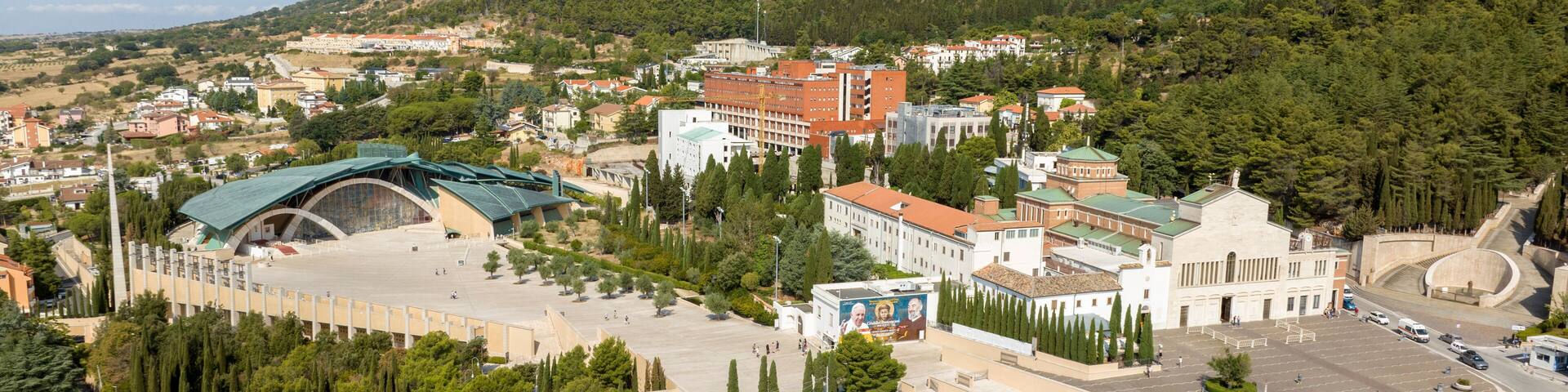 Aerial view of the Sanctuary of Saint Pio of Pietrelcina, also known as Padre Pio Pilgrimage Church, and the sanctuary of Santa Maria delle Grazie located in San Giovanni Rotondo, Puglia, Italy.