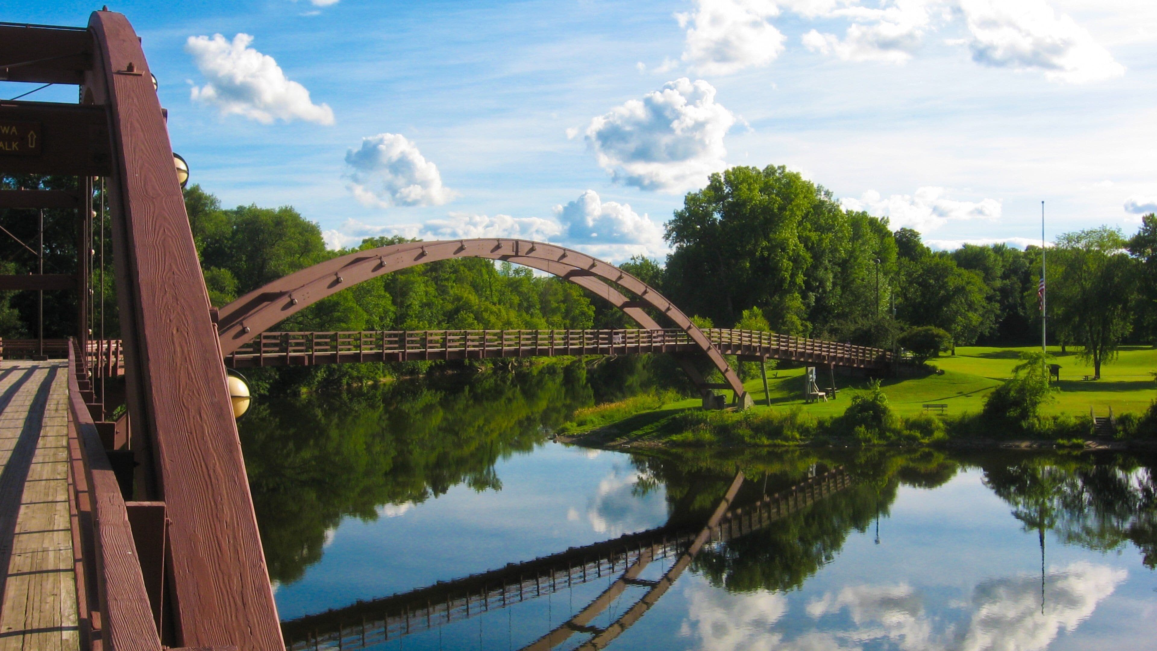Midland showing a river or creek, a park and a bridge