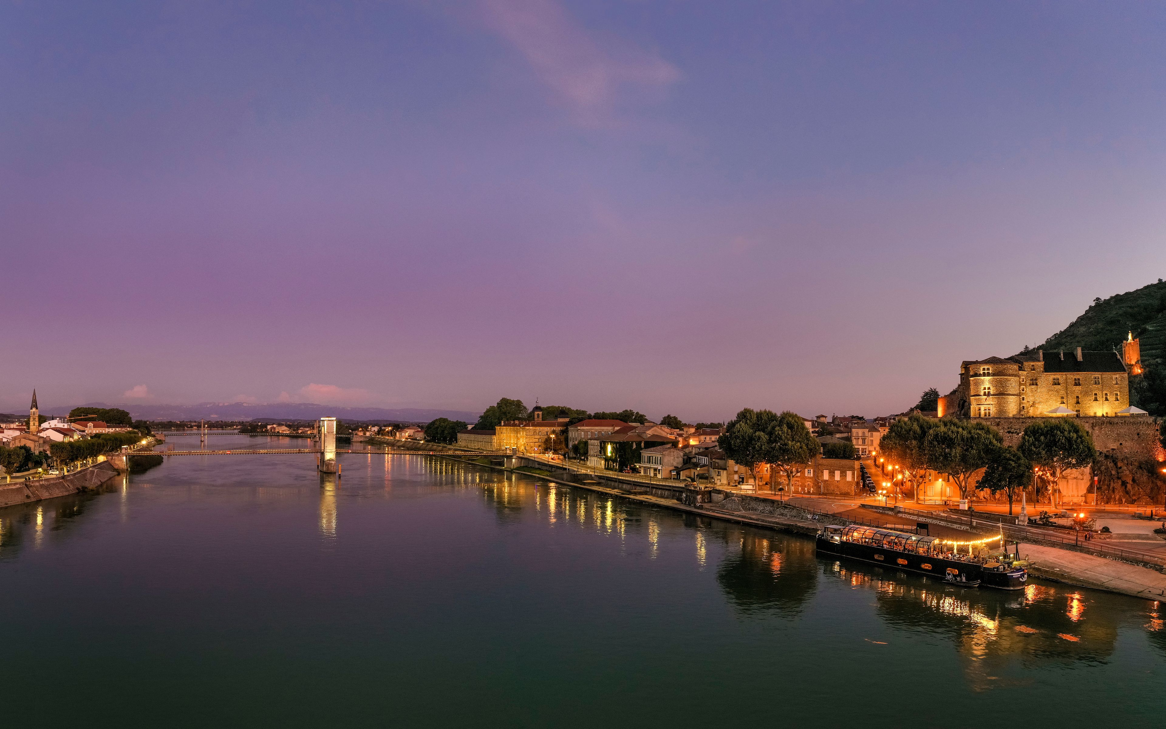 France, Tournon Sur Rhone, Townscape with river at sunset