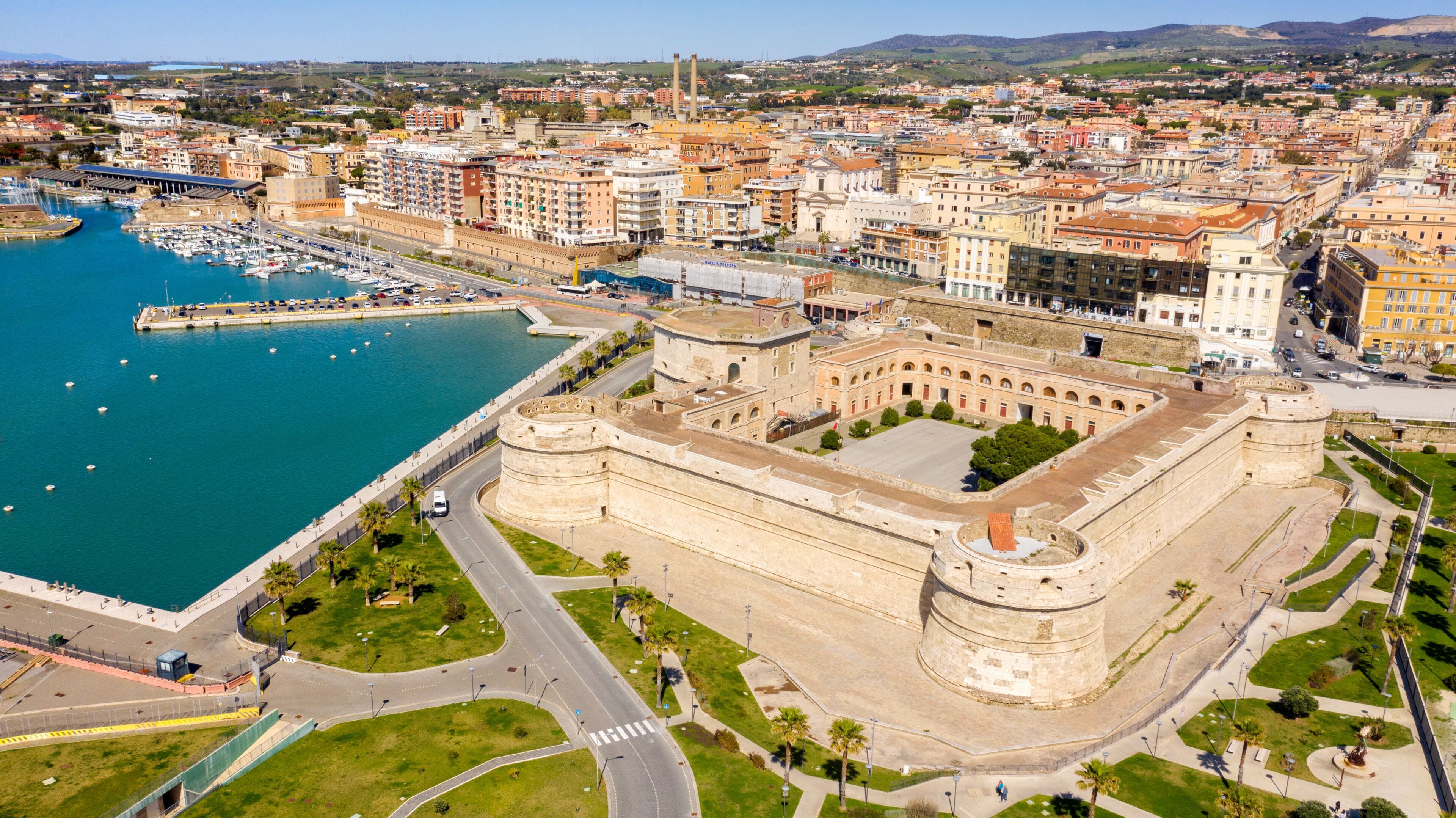 Aerial view of Fort Michelangelo, located in the port of Civitavecchia, in the Metropolitan City of Rome, Italy. The castle is in the shape of a quadrilateral and is located on the city's waterfront.