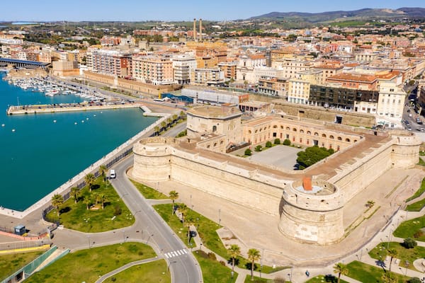 Aerial view of Fort Michelangelo, located in the port of Civitavecchia, in the Metropolitan City of Rome, Italy. The castle is in the shape of a quadrilateral and is located on the city's waterfront.