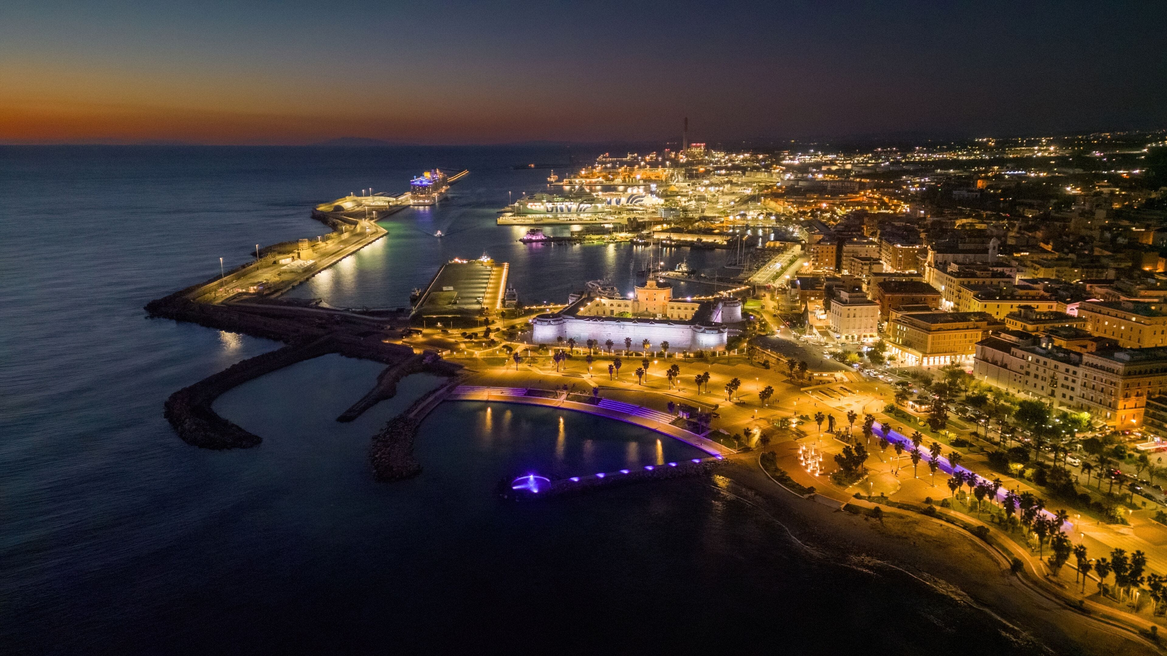 Small Italian town seen from above, sea and cars. Civitavecchia