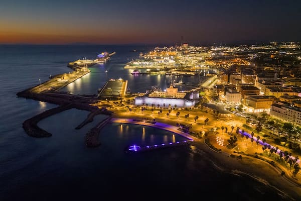 Small Italian town seen from above, sea and cars. Civitavecchia