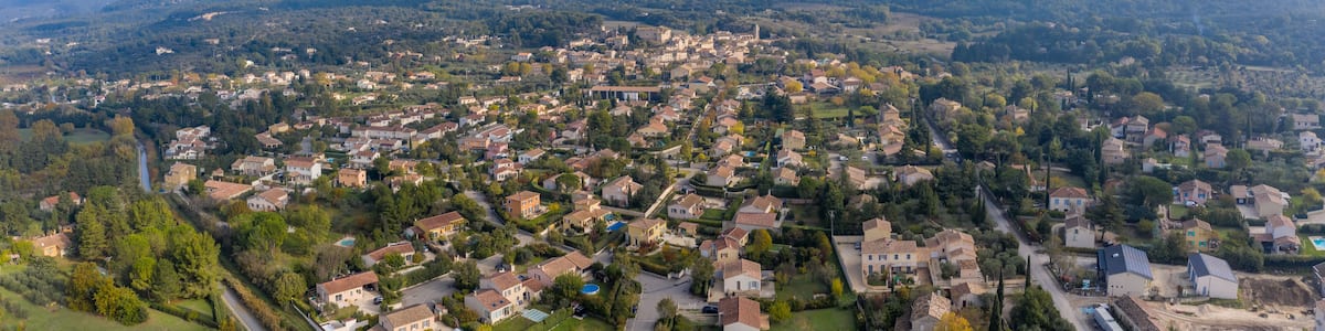 Panoramic aerial view of houses on cloudy day in Lagnes, France
