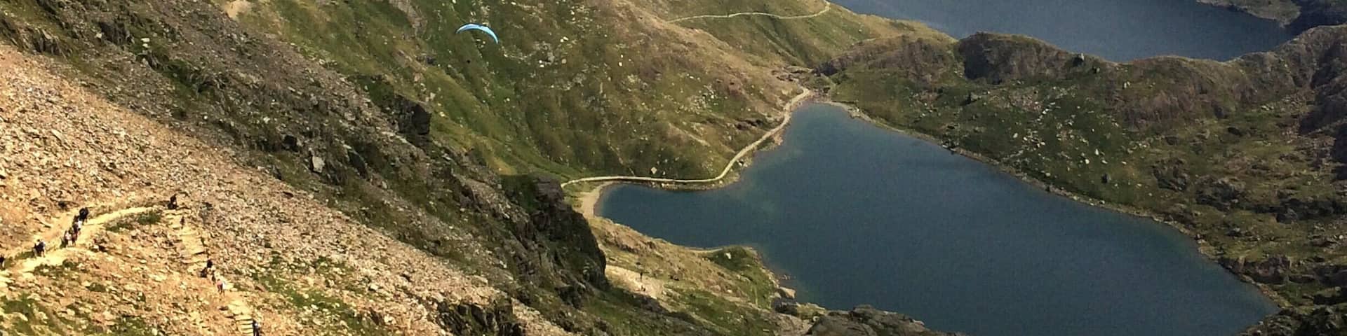 The view from the top of Mount Snowdon is worth the climb...and watch the paragliders below #EndlessSummer