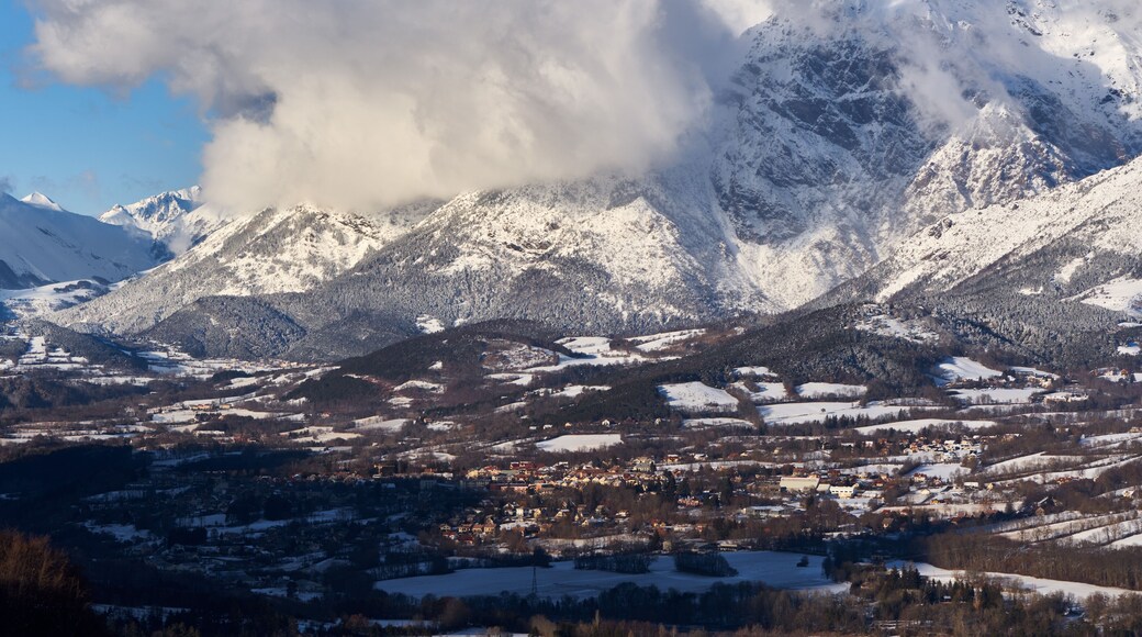 The village of Saint-Bonnet-en-Champsaur and the Petit Chaillol mountain peak in winter. Drac Valley, Hautes-Alpes, French Alps, France