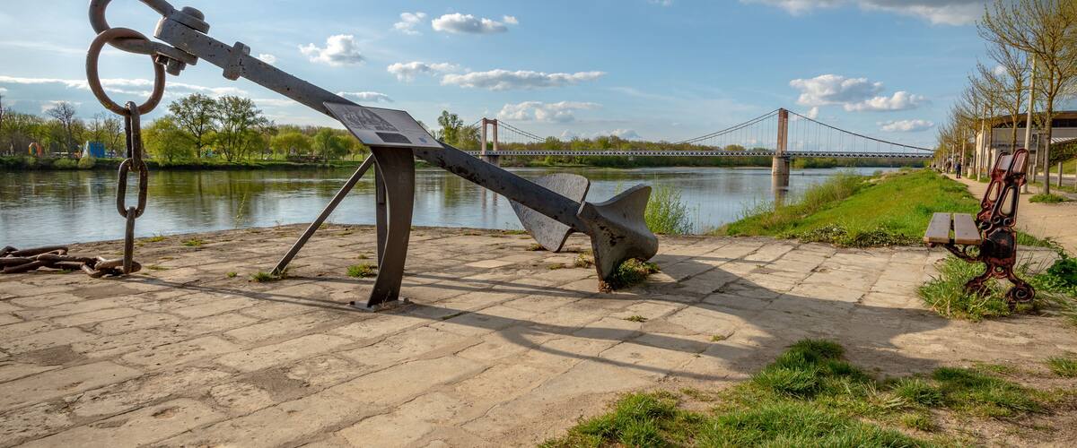 One old anchor on the edge of the Loire River in Cosne-Cours-sur-Loire, Burgundy, France