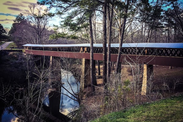This 270 ft covered bridge was built in 1921 and the only remaining bridge of it's kind in Cullman County. It was used mainly by farmers. It spans the Crooked Creek, site of Civil War Skirmishes under Nathan Bedford Forrest. Many relics have been found around this creek and can be viewed at the museum just down the road. This bridge is open to foot traffic and also offers picnic areas and walking trails. An old water mill is located on the property too. #roadtrip