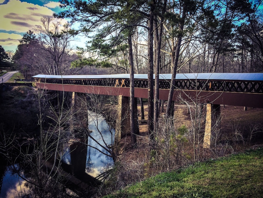 This 270 ft covered bridge was built in 1921 and the only remaining bridge of it's kind in Cullman County. It was used mainly by farmers. It spans the Crooked Creek, site of Civil War Skirmishes under Nathan Bedford Forrest. Many relics have been found around this creek and can be viewed at the museum just down the road. This bridge is open to foot traffic and also offers picnic areas and walking trails. An old water mill is located on the property too. #roadtrip