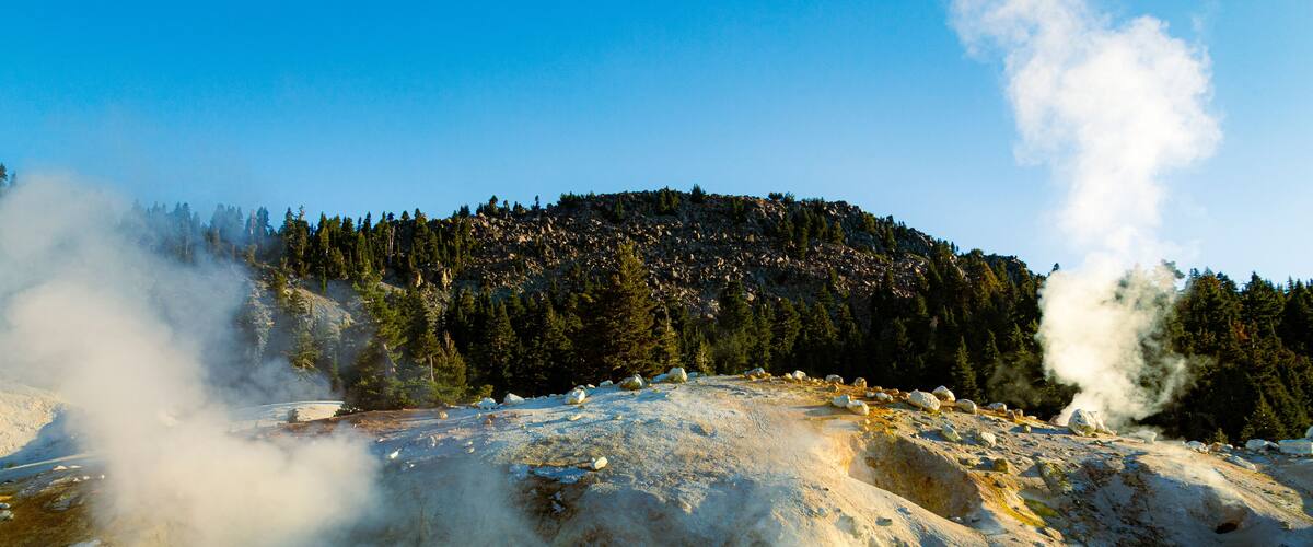 Large boiling mud pot at Bumpass Hell in Lassen Volcanic National Park in Northern California, USA.