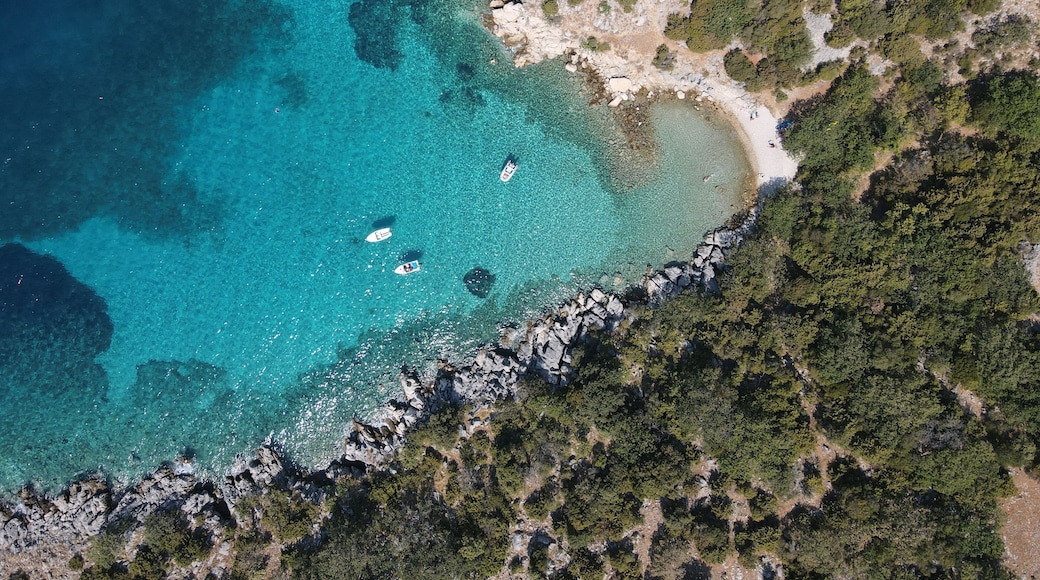 Aerial view of Potocnica, Lun and Novalja in island of Pag, archipelago of Croatia. Panoramic drone view of waterfront, idyllic and turquoise sea in Novalja, Adriatic Sea in Dalmatia region.