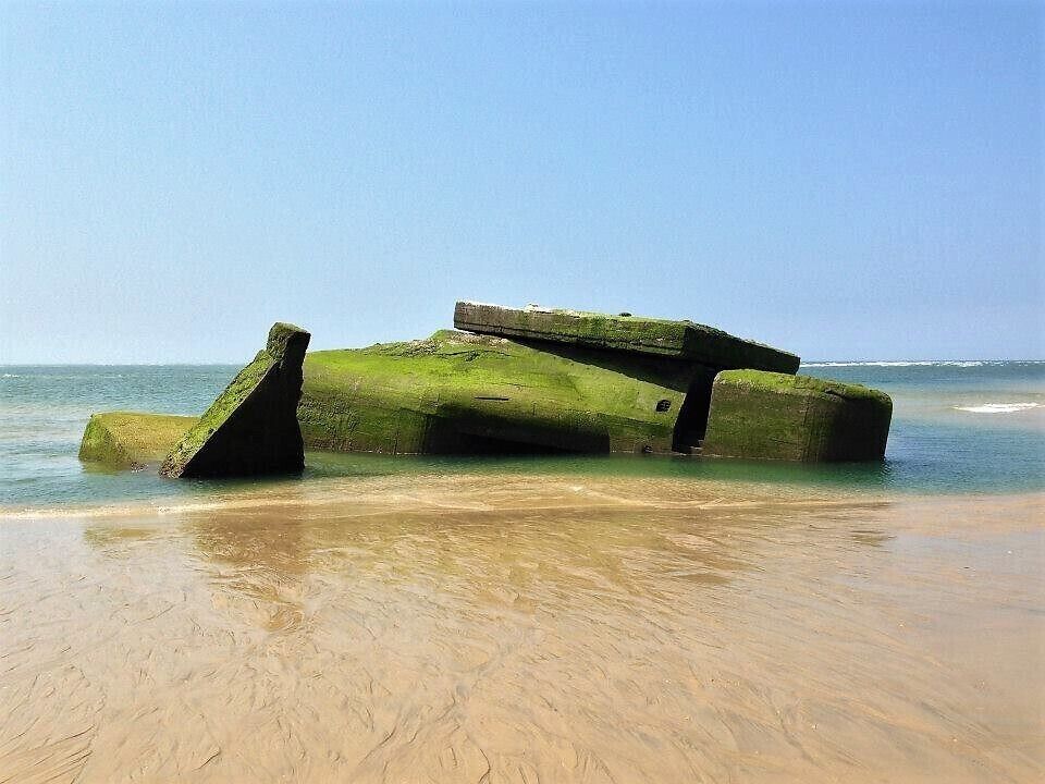 Remnant from WWII German "blockhaus" lying on the beach #lifeatexpedia